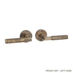 Signature Hardware Signature Hardware SH552157AB EH.RO.2625.20.L.ABS-NB-N - Straight Knurled Solid Brass Privacy Interior Door Set W/ Round Escutcheon Lever Handle Accomodates 28 Degree Privacy Latch - Left Hand - No Backset - Antique Brass